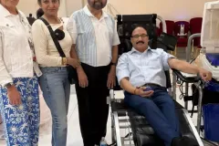 APS Medical council member, Dr. Sunil Mehra and Dr. Abhay Malhotra donating blood at APS blood drive